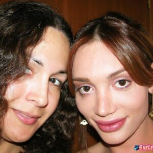 Tranny pornstars Mariana Cordoba and Nikki Montero take nude self shots in a mirror