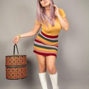 Trans model Bailey Jay sets her enhanced breasts loose in white knee socks