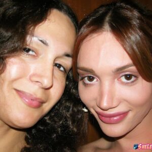 T-girl pornstars Mariana Cordoba & Nikki Montero take nude self shots in a mirror