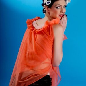 Skinny tranny Mandy Mitchell gets naked with her hair in curlers for a retro shoot