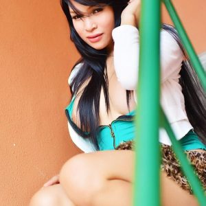 Asian ladyboy Vitress Tamayo flashes her upskirt panties on a balcony
